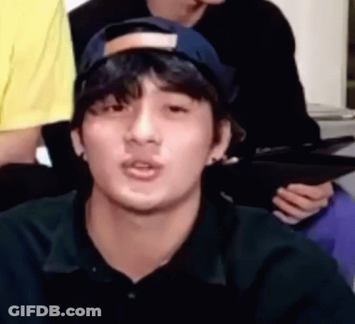 Young Man In Baseball Cap Making Funny Face GIF