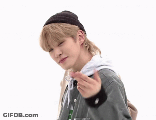 Young Man In Beanie And Green Jacket Making Funny Face GIF