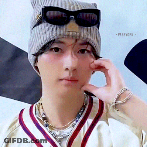 Young Man In Beanie And Sunglasses Making A Face GIF