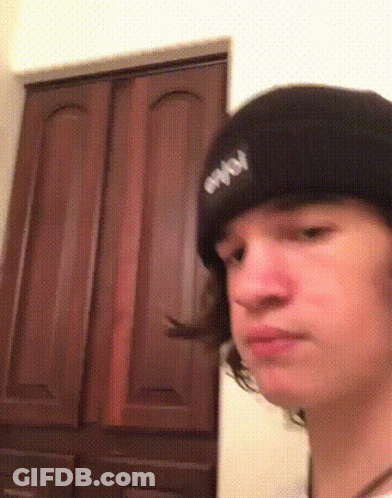 Young Man In Beanie Making Funny Face GIF