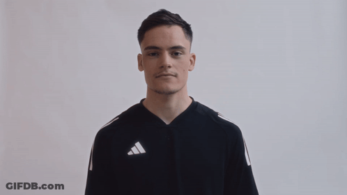 Young Man In Black Adidas Shirt Making Funny Face GIF