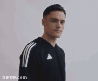 Young Man In Black Adidas T-Shirt Arms Crossed GIF