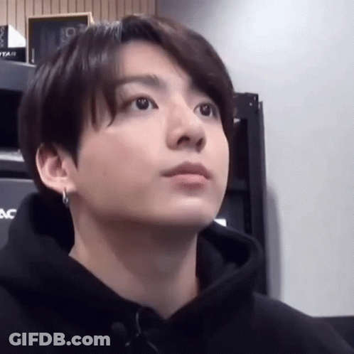 Young Man In Black Hoodie Close Up GIF