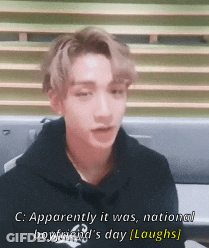 Young Man In Black Hoodie Laughing About National Boyfriend's Day GIF