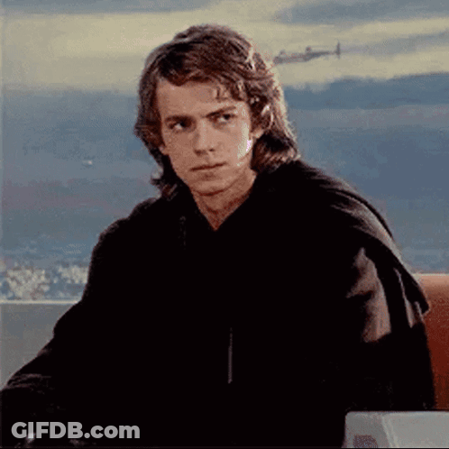 Young Man In Black Hoodie Sitting By Window GIF