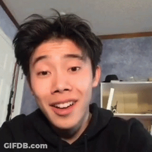 Young Man In Black Hoodie Smiling GIF