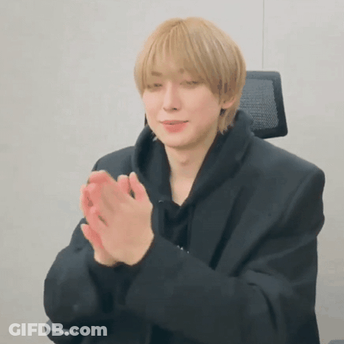 Young Man In Black Jacket Clapping Hands GIF