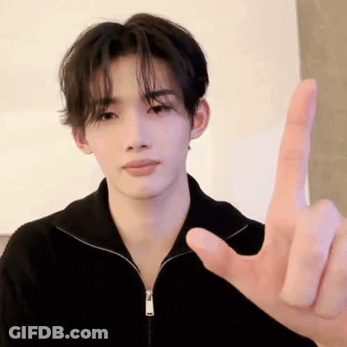 Young Man In Black Jacket Making Middle Finger Sign GIF