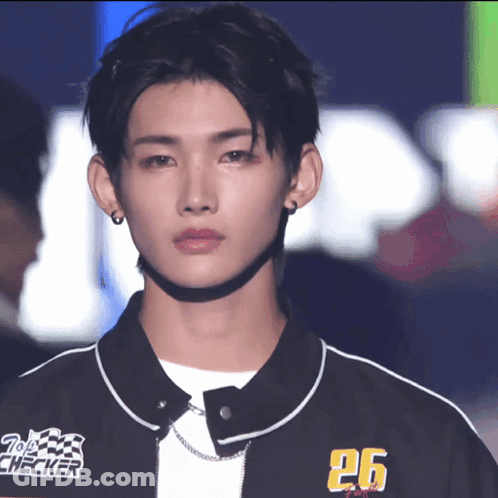 Young Man In Black Jacket Number 26 GIF