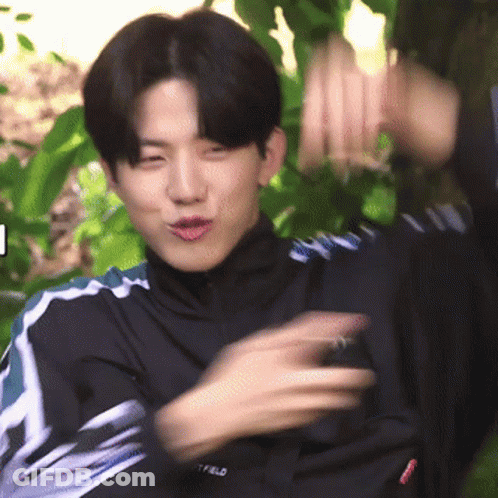 Young Man In Black Jacket With Field GIF