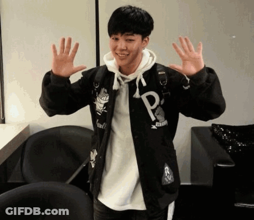 Young Man In Black Jacket With Letter P GIF