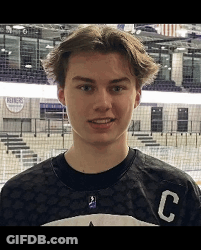 Young Man In Black Jersey With Letter C GIF
