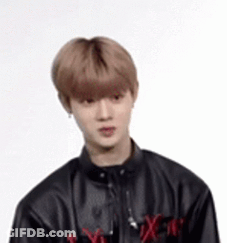 Young Man In Black Leather Jacket With Earphones GIF