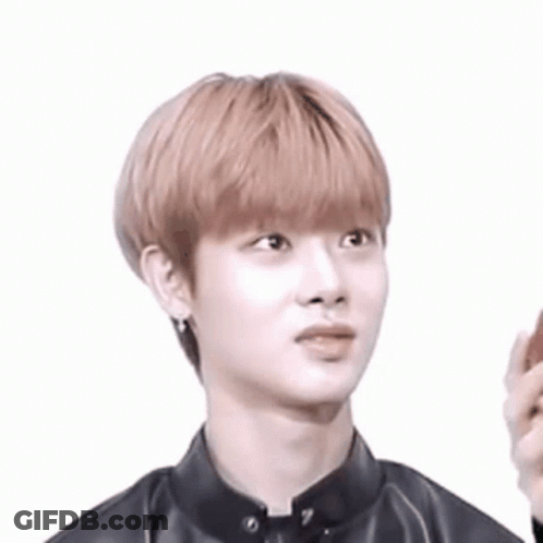 Young Man In Black Leather Jacket With Earrings GIF