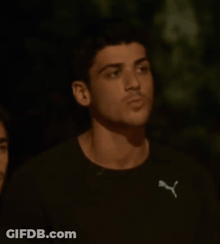 Young Man In Black Puma T-Shirt GIF