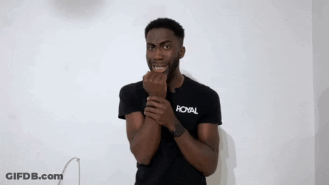 Young Man In Black Royal T-Shirt Making Funny Face GIF