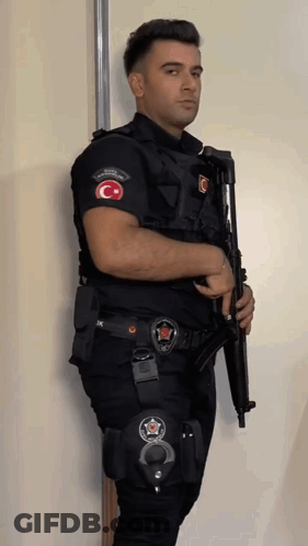 Young Man In Black Security Tank Top GIF
