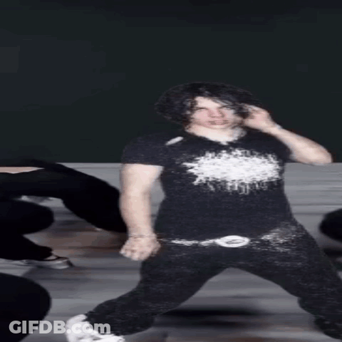 Young Man In Black Shirt And Black Pants GIF