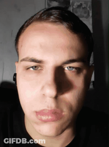 Young Man In Black Shirt GIF