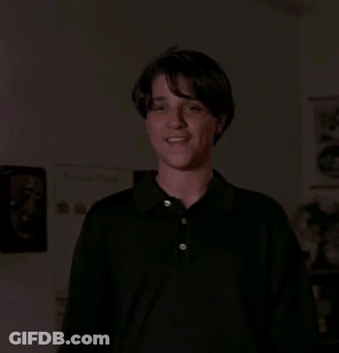 Young Man In Black Shirt Giving Thumbs Up GIF