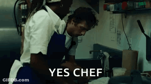 Young Man In Black Shirt In Dark Room GIF