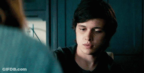 Young Man In Black Shirt Looking At Woman GIF