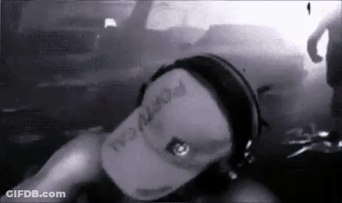 Young Man In Black Shirt Making Funny Face GIF