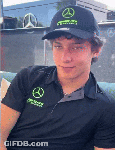 Young Man In Black Shirt Saying AMG GIF