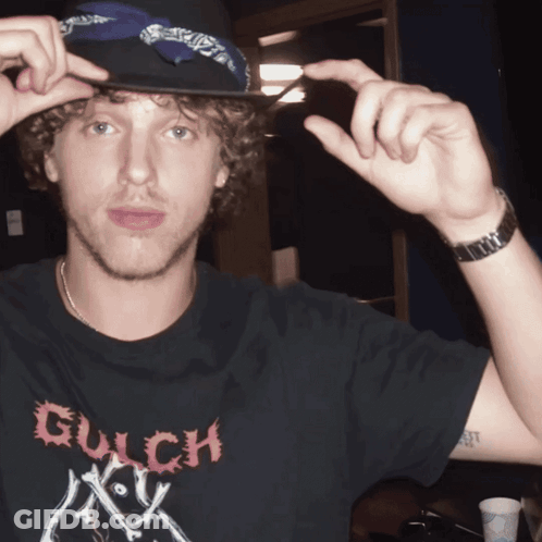 Young Man In Black Shirt Saying Gulch GIF