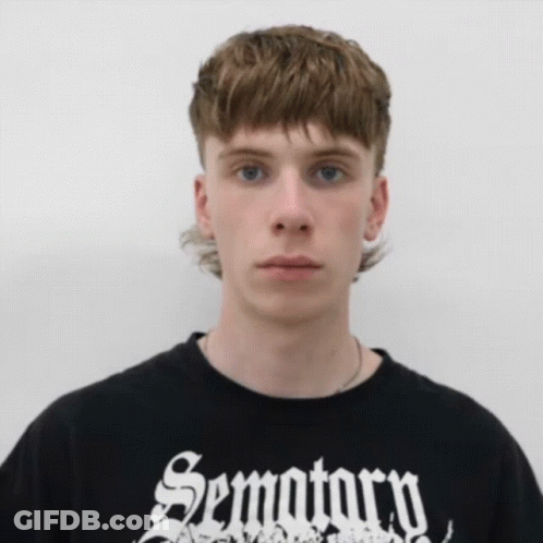 Young Man In Black Shirt Saying Sematary GIF