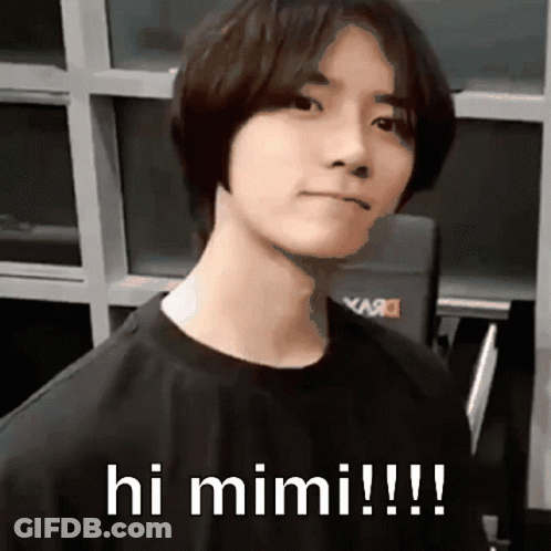 Young Man In Black Shirt Says Hi Mimi GIF