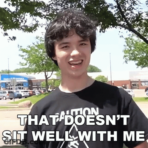 Young Man In Black Shirt That Doesn't Sit Well With Me GIF