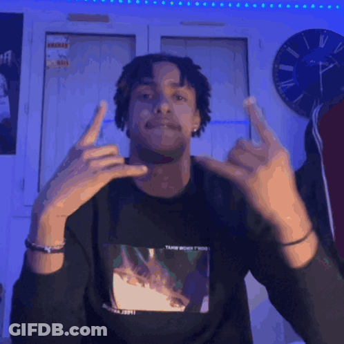 Young Man In Black Shirt With Fish Picture GIF