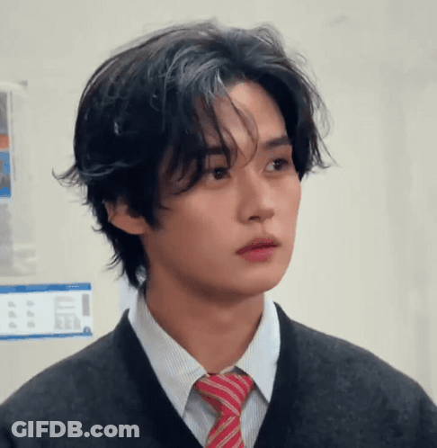Young Man In Black Sweater And Red Tie GIF