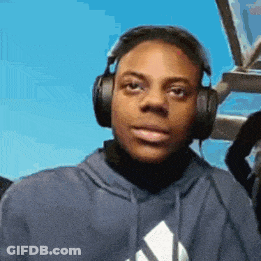 Young Man In Blue Adidas Hoodie With Headphones GIF