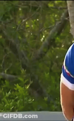 Young Man In Blue Adidas Sweater Standing In Doorway GIF
