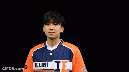 Young Man In Blue And Orange Jersey With Letter L GIF