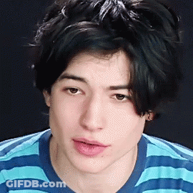 Young Man In Blue And White Striped Shirt GIF