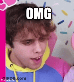 Young Man In Blue And Yellow Hoodie Making Funny Face Saying OMG GIF