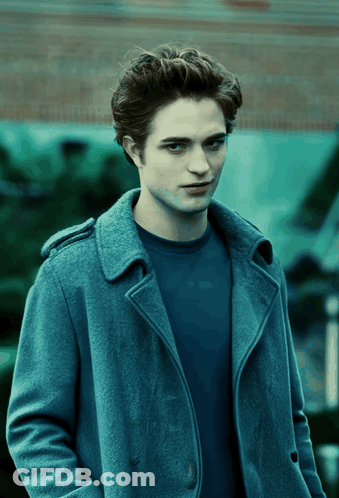 Young Man In Blue Coat And Shirt GIF