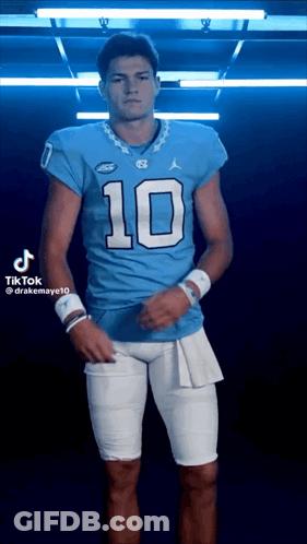 Young Man In Blue Football Jersey Number 10 GIF