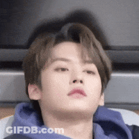 Young Man In Blue Hoodie Laying Down GIF