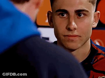 Young Man In Blue Hoodie Looking At Another Man GIF