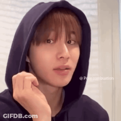 Young Man In Blue Hoodie Looking At Camera GIF