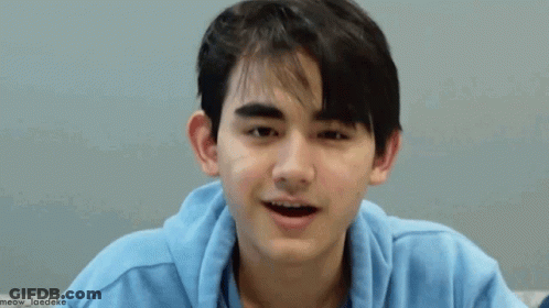 Young Man In Blue Hoodie Making Funny Face GIF