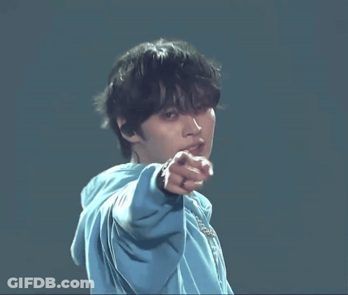 Young Man In Blue Hoodie Pointing Finger GIF