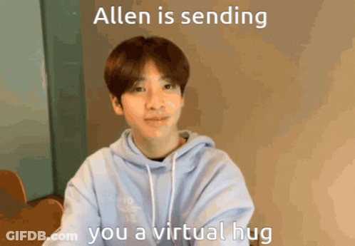 Young Man In Blue Hoodie Sending Virtual Hug GIF
