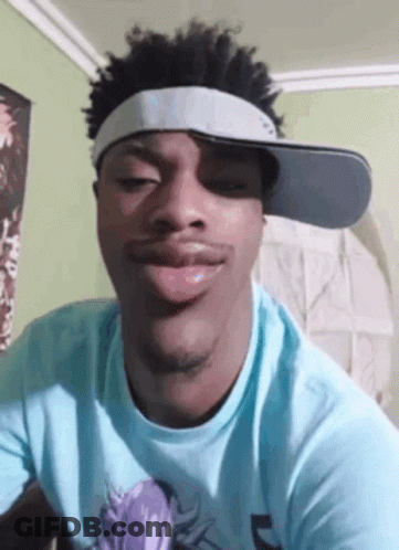 Young Man In Blue Shirt And Hat Making Funny Face GIF