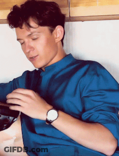 Young Man In Blue Shirt And Watch GIF