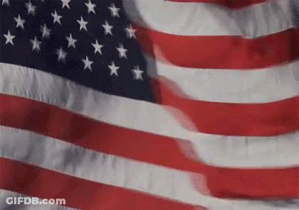 Young Man In Blue Shirt Blowing Kiss GIF